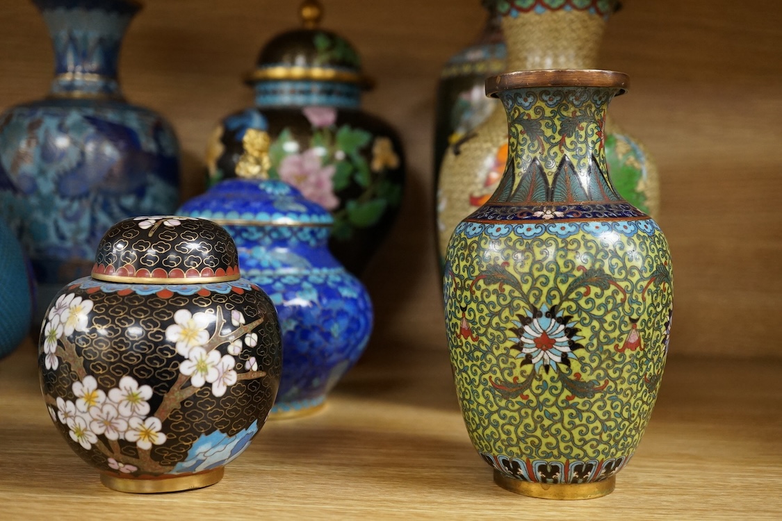 Thirteen various sized Chinese cloisonné enamel jars with covers and similar vases, tallest vase 31cm high.